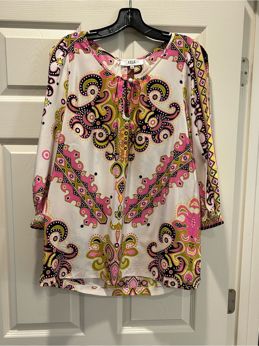 Stylish Pink Paisley Print Women's Blouse white arm cut out detail. 100% silk